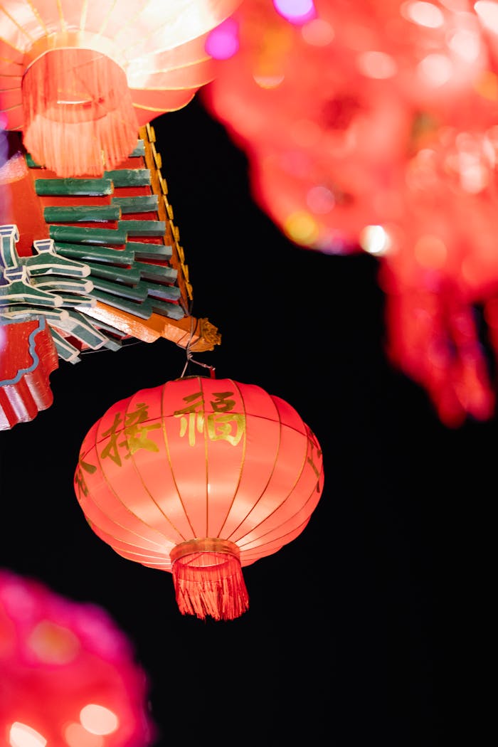 ours-journey Low angle of traditional Chinese lanterns for traditional festival hanging against night sky